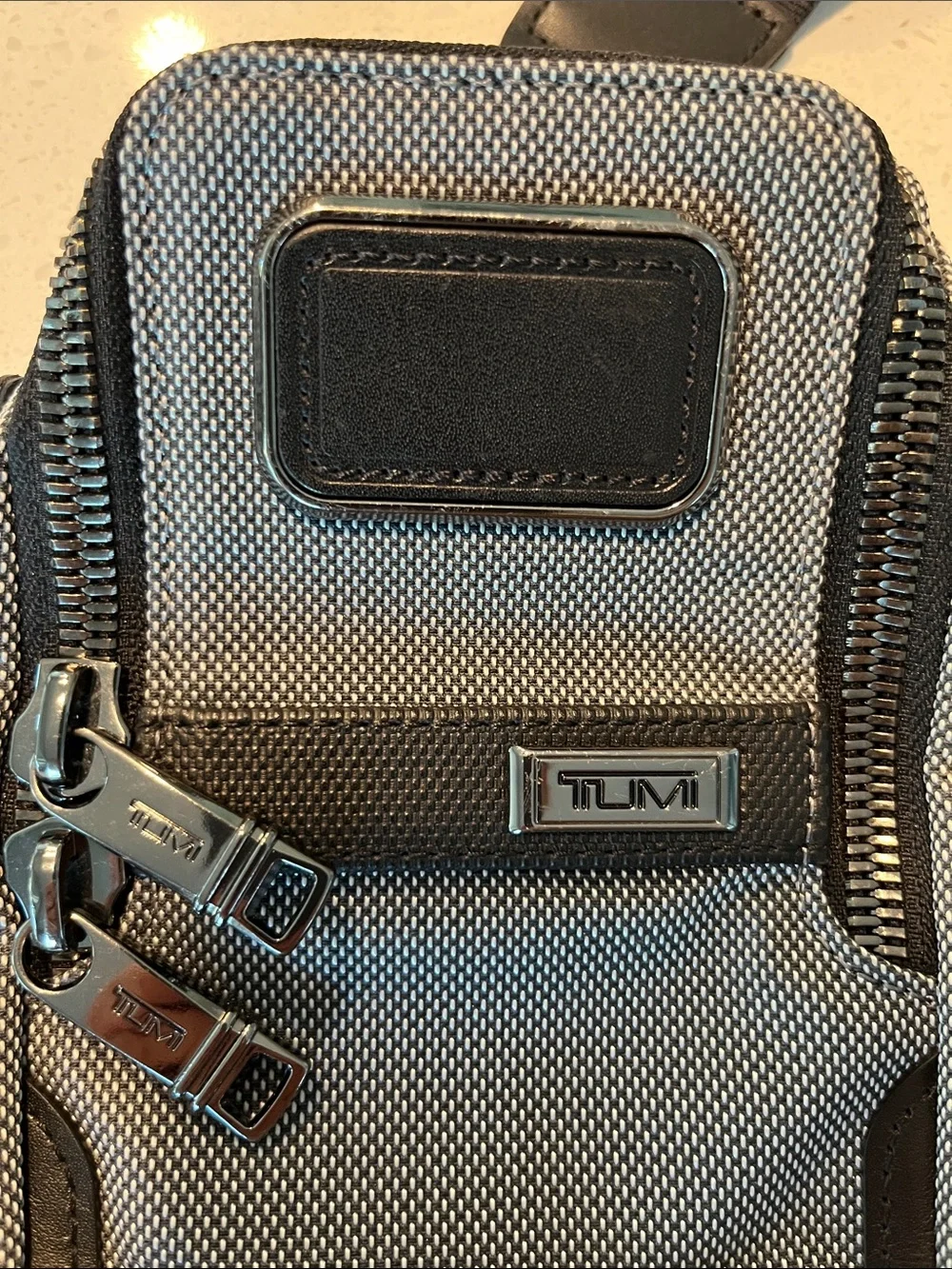 Tumi Alpha X Men's Sling Belt Bag in Gray and Black
